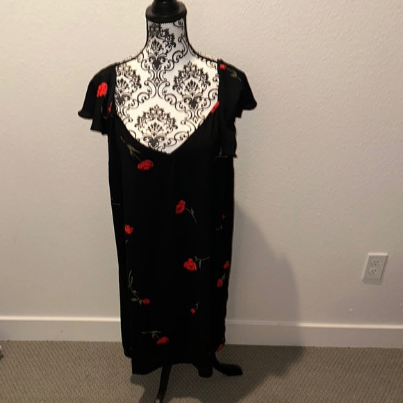 Black Sleeveless Dress with Embellished Front Design - Picture 6 of 6